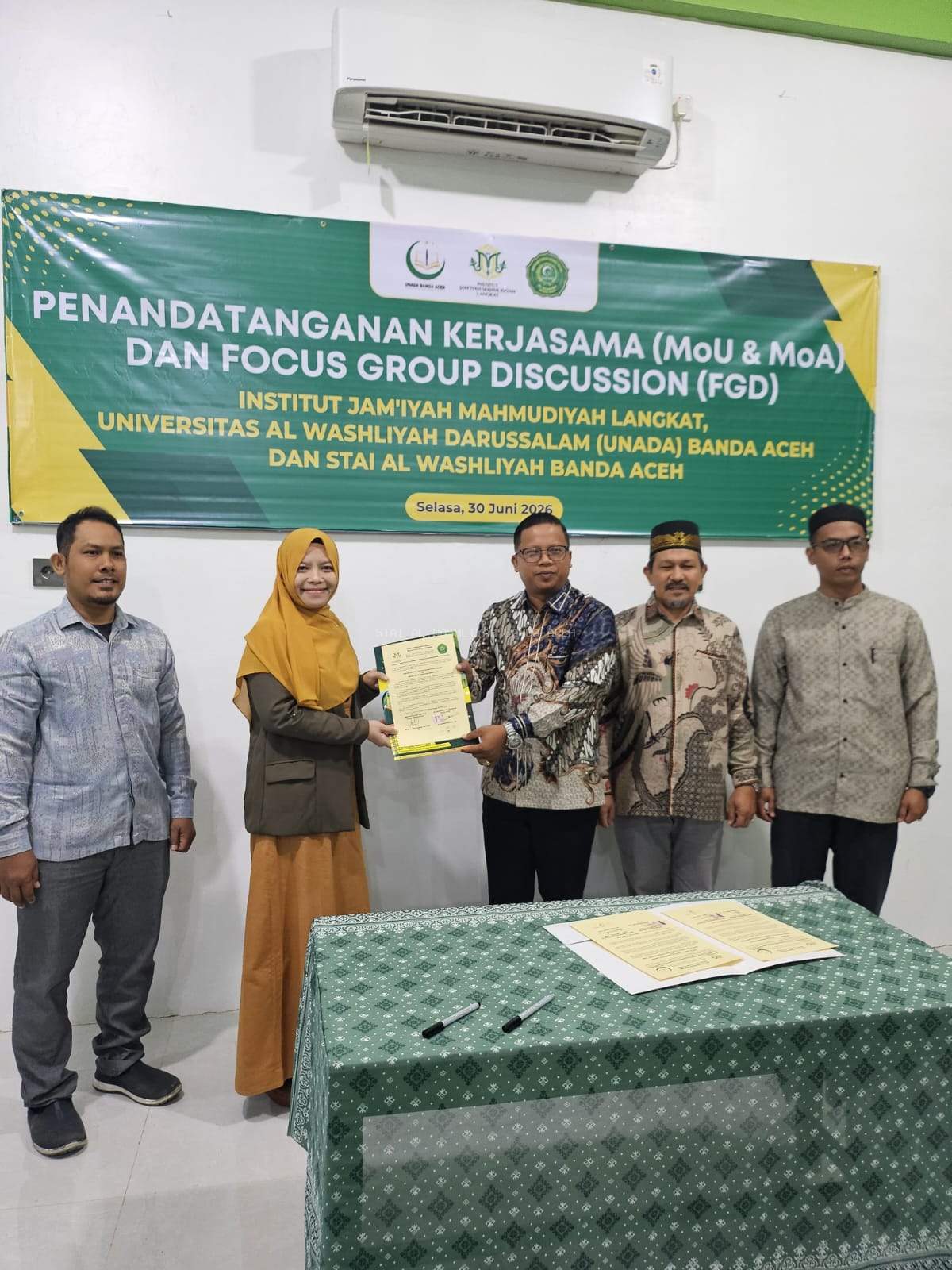 STAI Al Washliyah Banda Aceh melakukan Penandatanganan MoU-MoA dengan Institut Jam'iyah Mahmudiyah Langkat